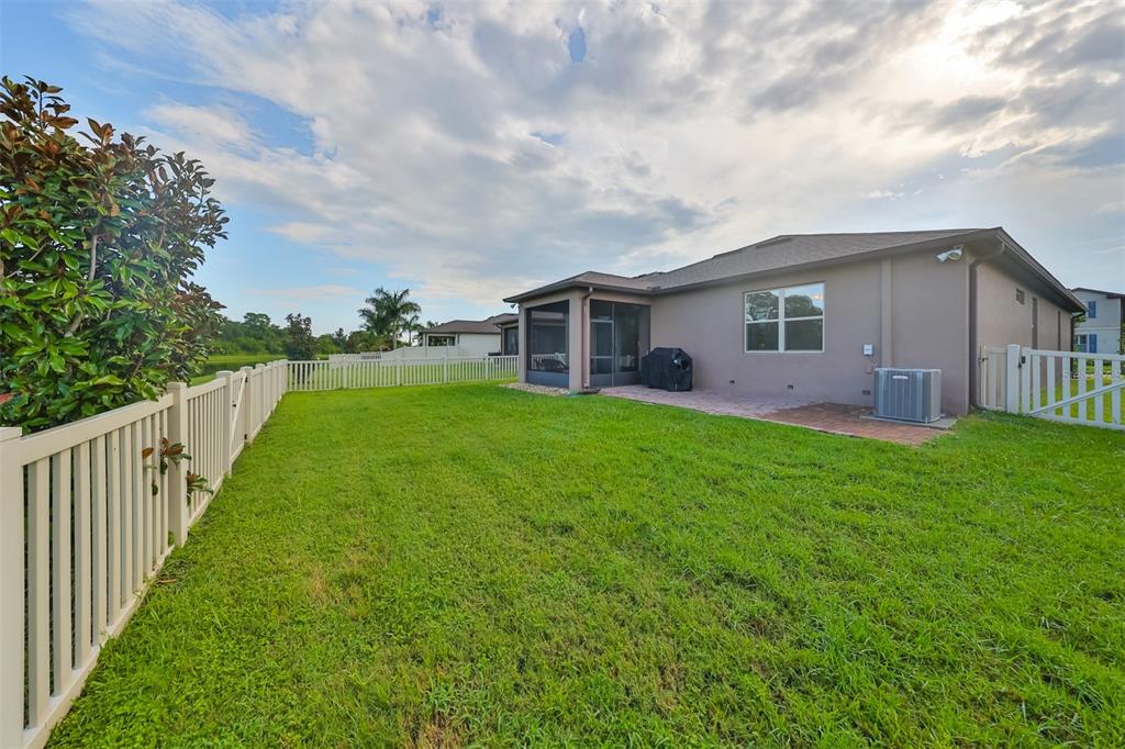 1606 Cabbage Key Drive Ruskin, FL 33570 - Photo 19 of 31 a view of a house with backyard and porch