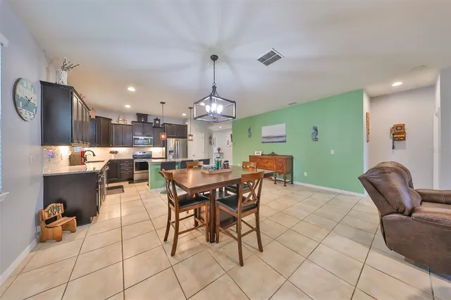 a view of a dining room with furniture