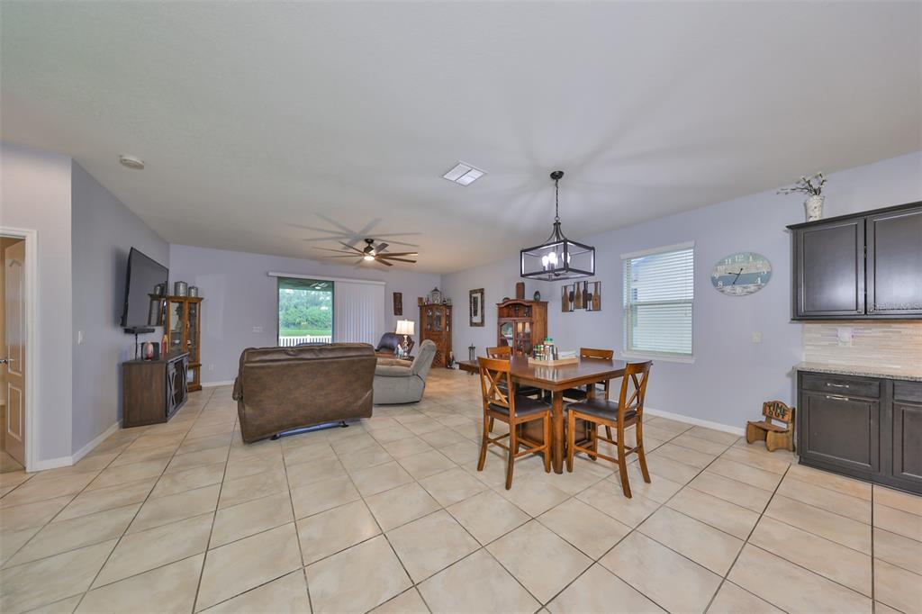 1606 Cabbage Key Drive Ruskin, FL 33570 - Photo 10 of 31 a view of a dining room with furniture
