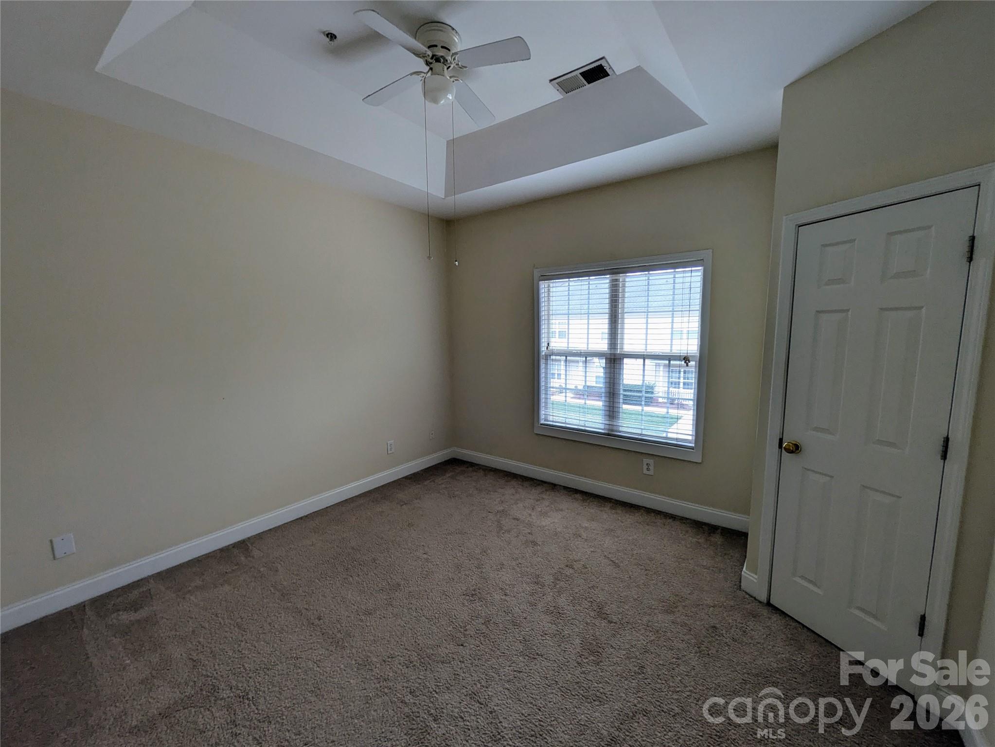 917 Shearer Street, Unit 20 Davidson, NC 28036 - Photo 8 of 16 an empty room with a window
