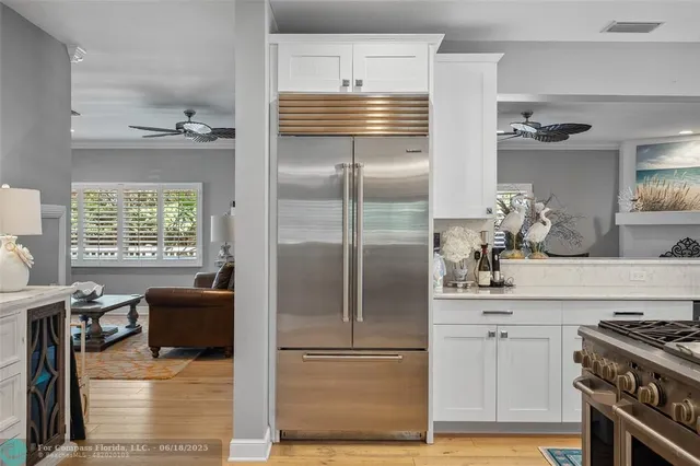 a view of a living room and dining room