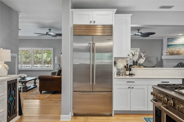 a view of a living room and dining room
