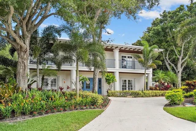 front view of a house with a garden