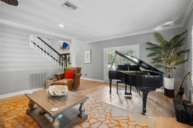 a bathroom with a toilet a sink and a mirror