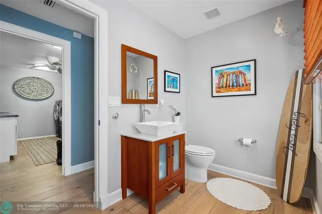 a bathroom with a shower and toilet