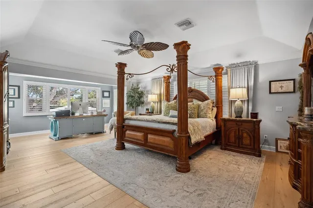 a view of a balcony with lake view and a potted plant