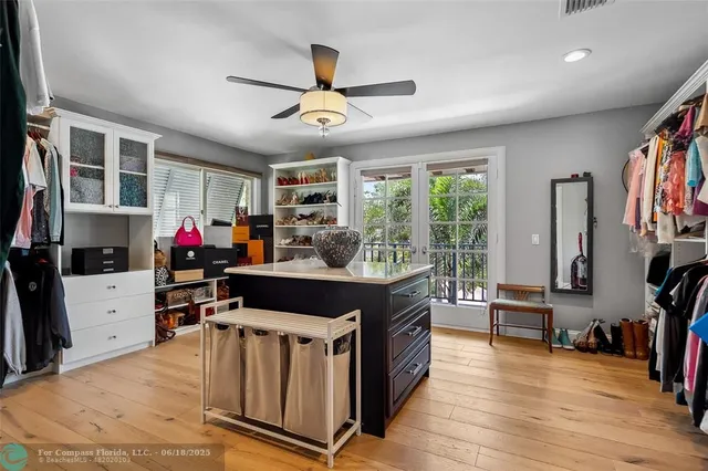 a view of a living room and kitchen