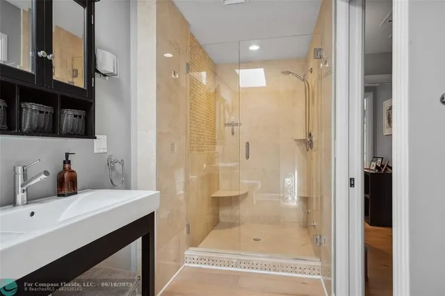 a building outdoor space with patio furniture and potted plants