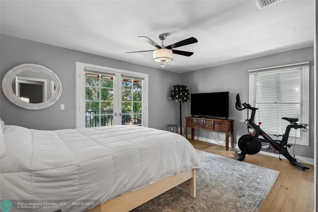 a view of a livingroom with furniture and windows