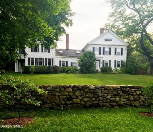 a view of a house with a garden