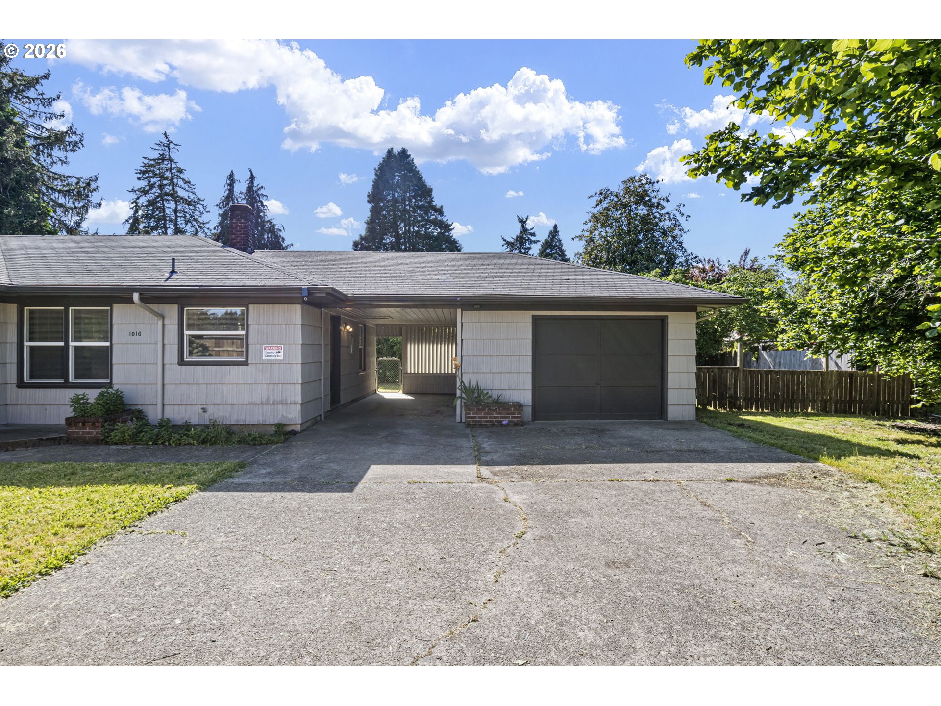1008 Coburg Road Eugene, OR 97401 - Photo 22 of 46 front view of a house with a yard