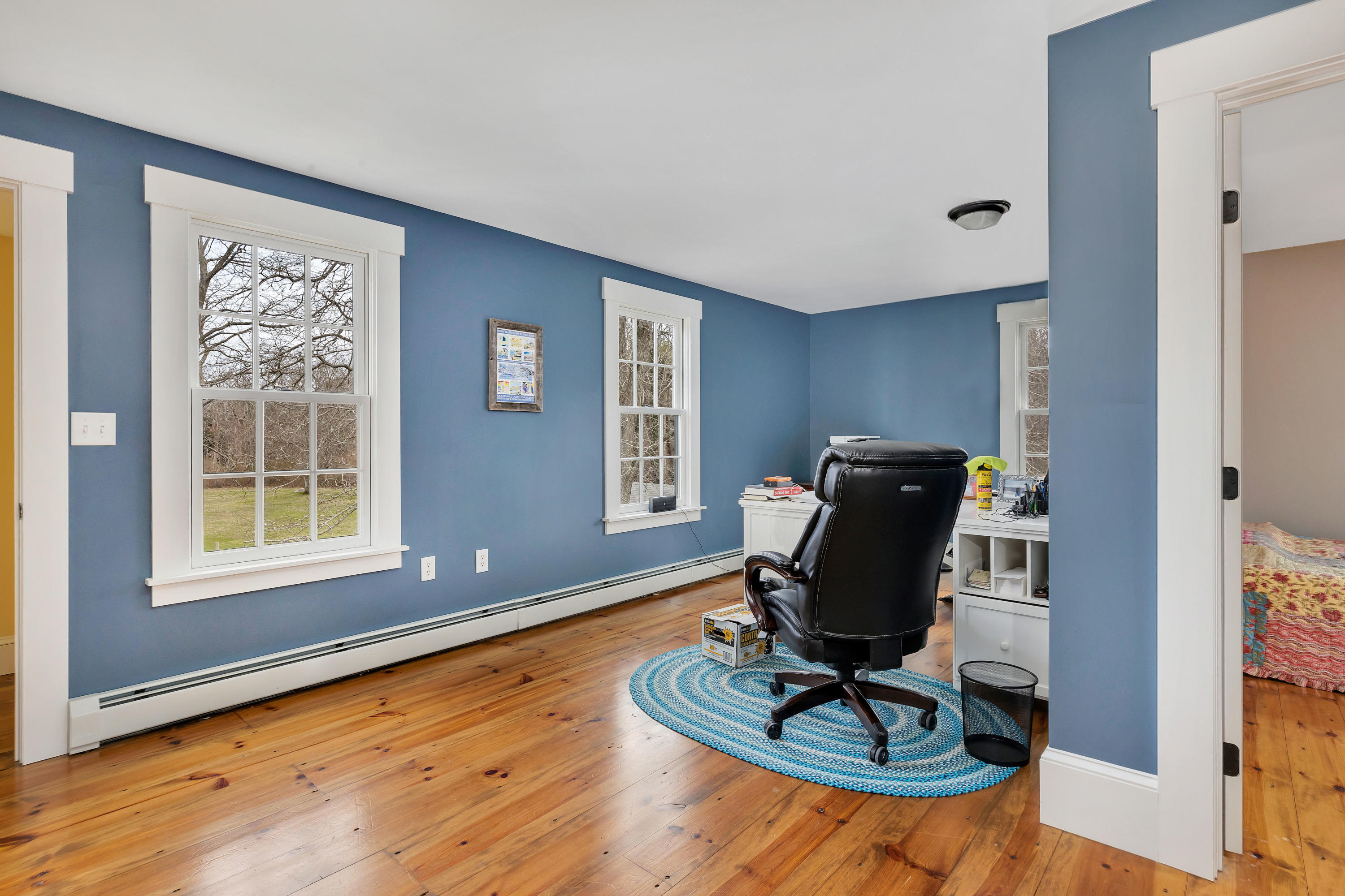 251 Tonset Road Orleans, MA 02653 - Photo 13 of 61 a living room with furniture rug and a window
