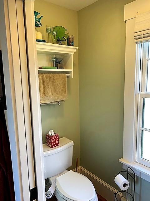 251 Tonset Road Orleans, MA 02653 - Photo 16 of 61 a white toilet sitting next to a sink