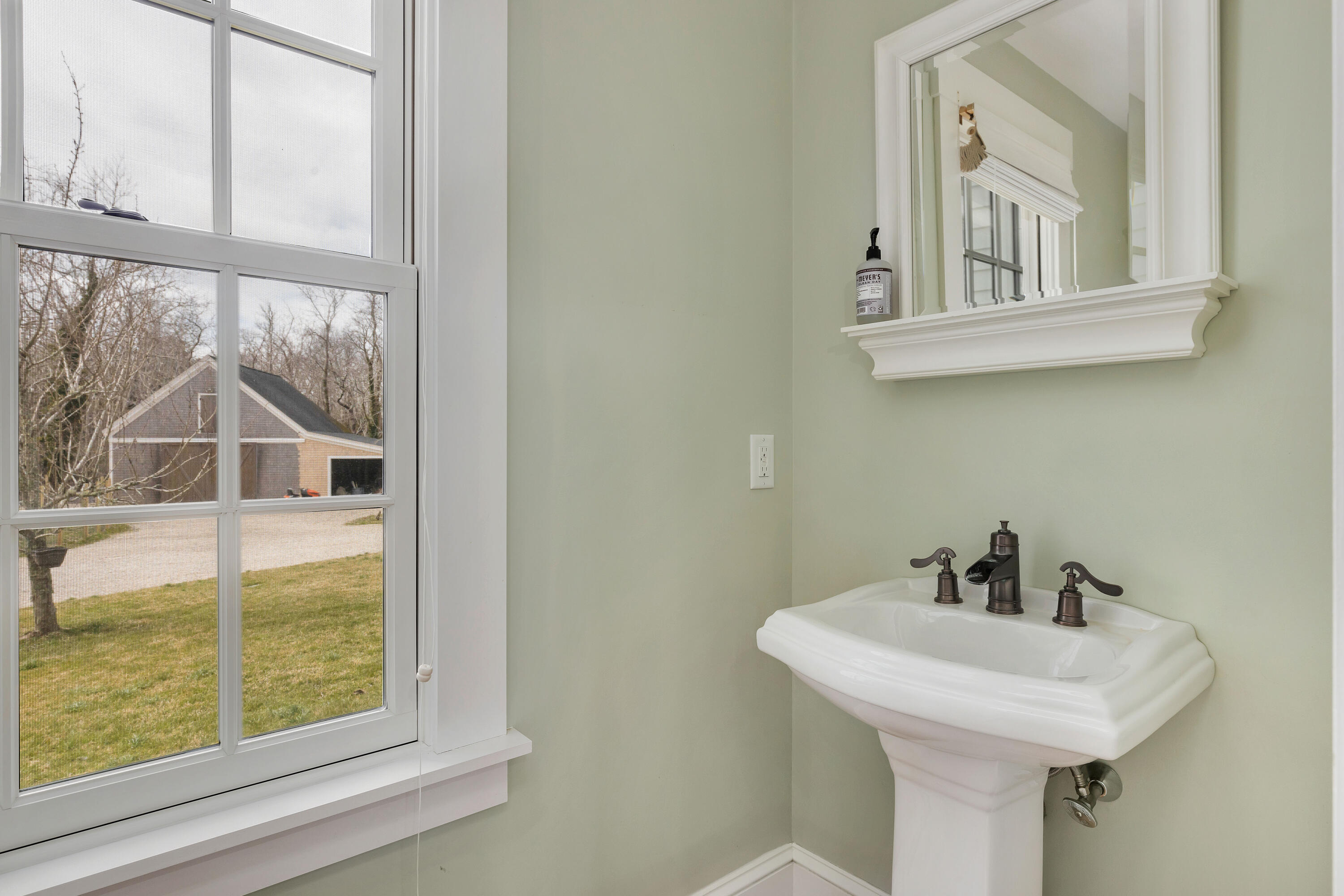 251 Tonset Road Orleans, MA 02653 - Photo 17 of 61 a bathroom with a sink and a window