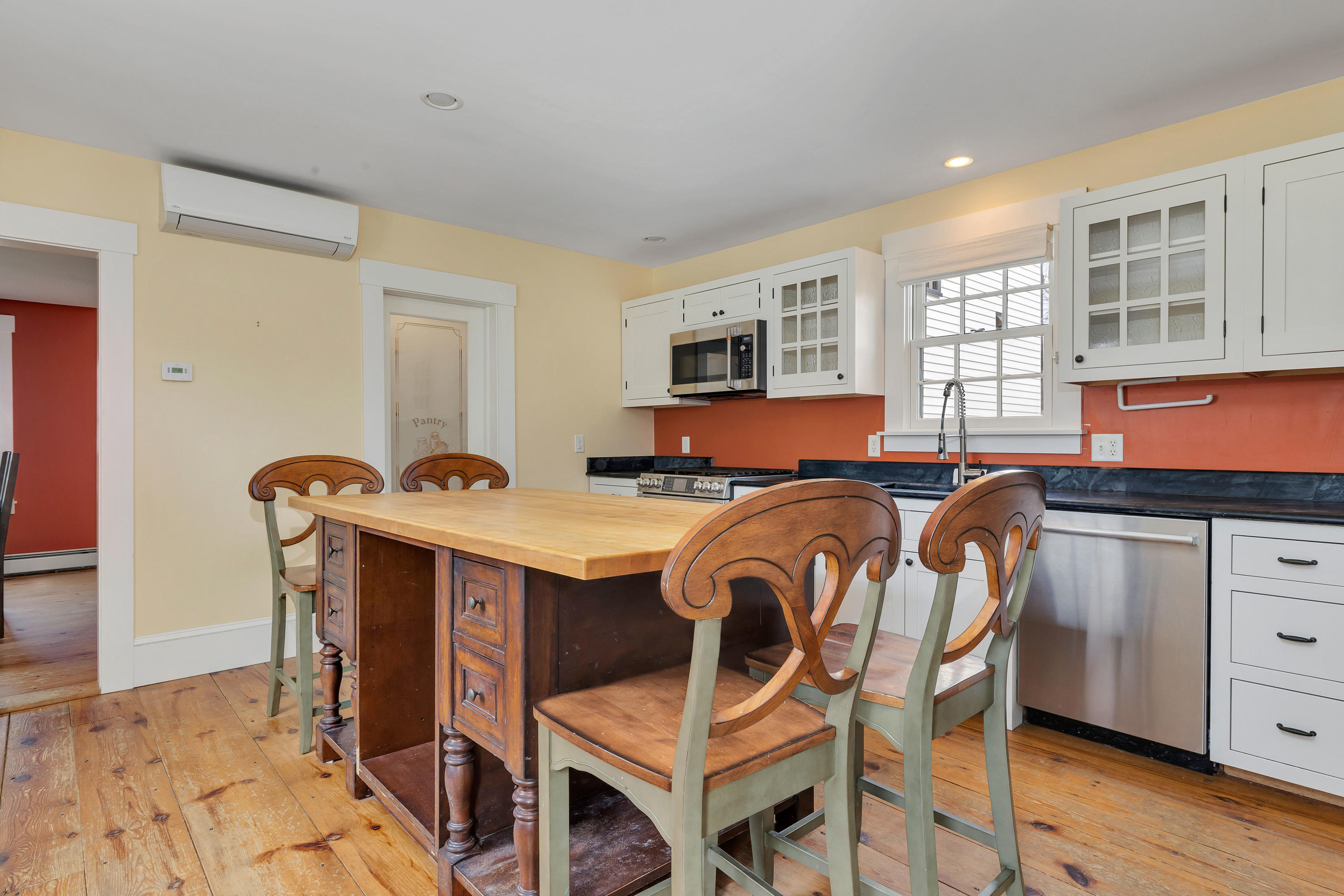 251 Tonset Road Orleans, MA 02653 - Photo 23 of 61 a bed room with a bed and furniture