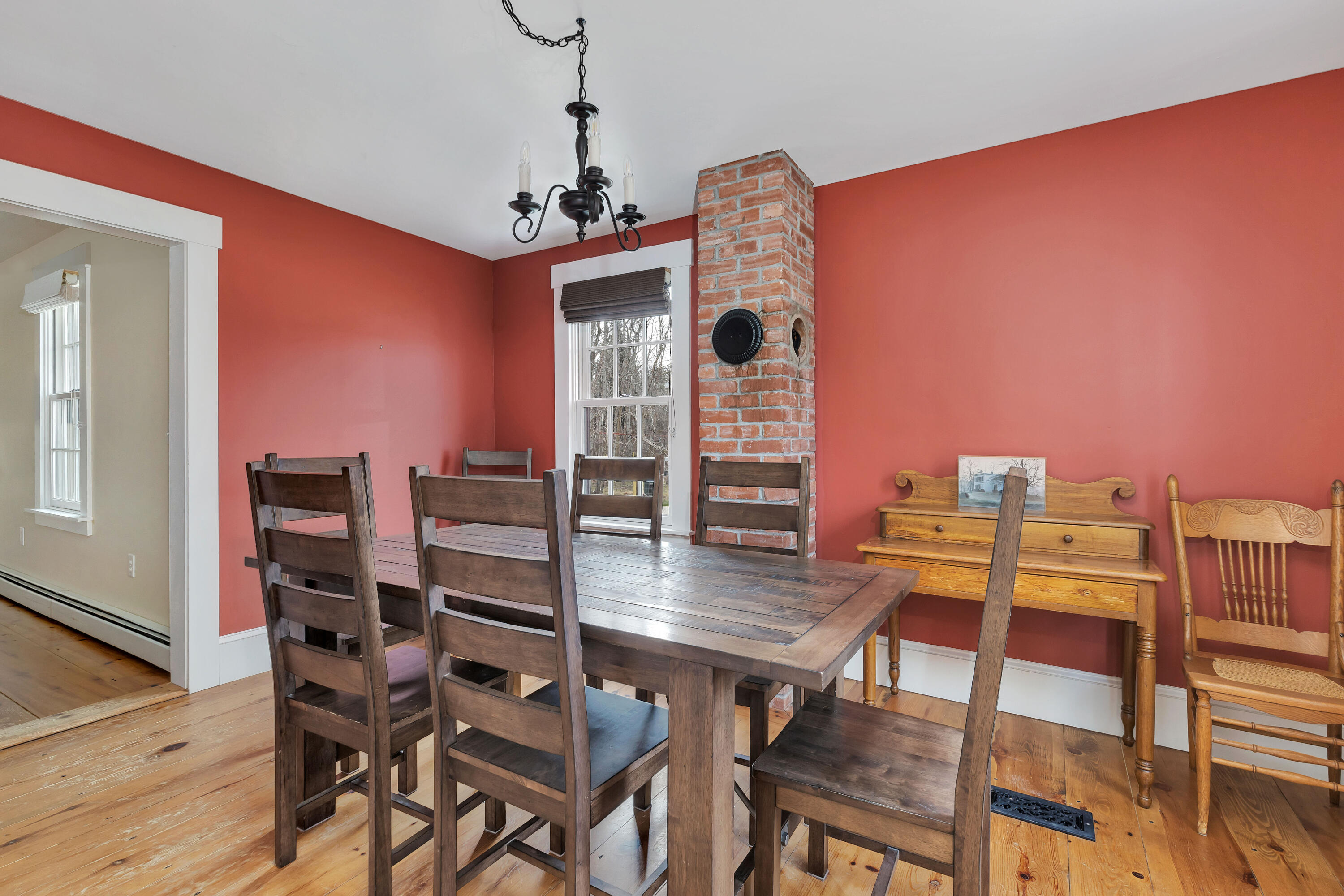 251 Tonset Road Orleans, MA 02653 - Photo 28 of 61 a dining room with furniture and wooden floor