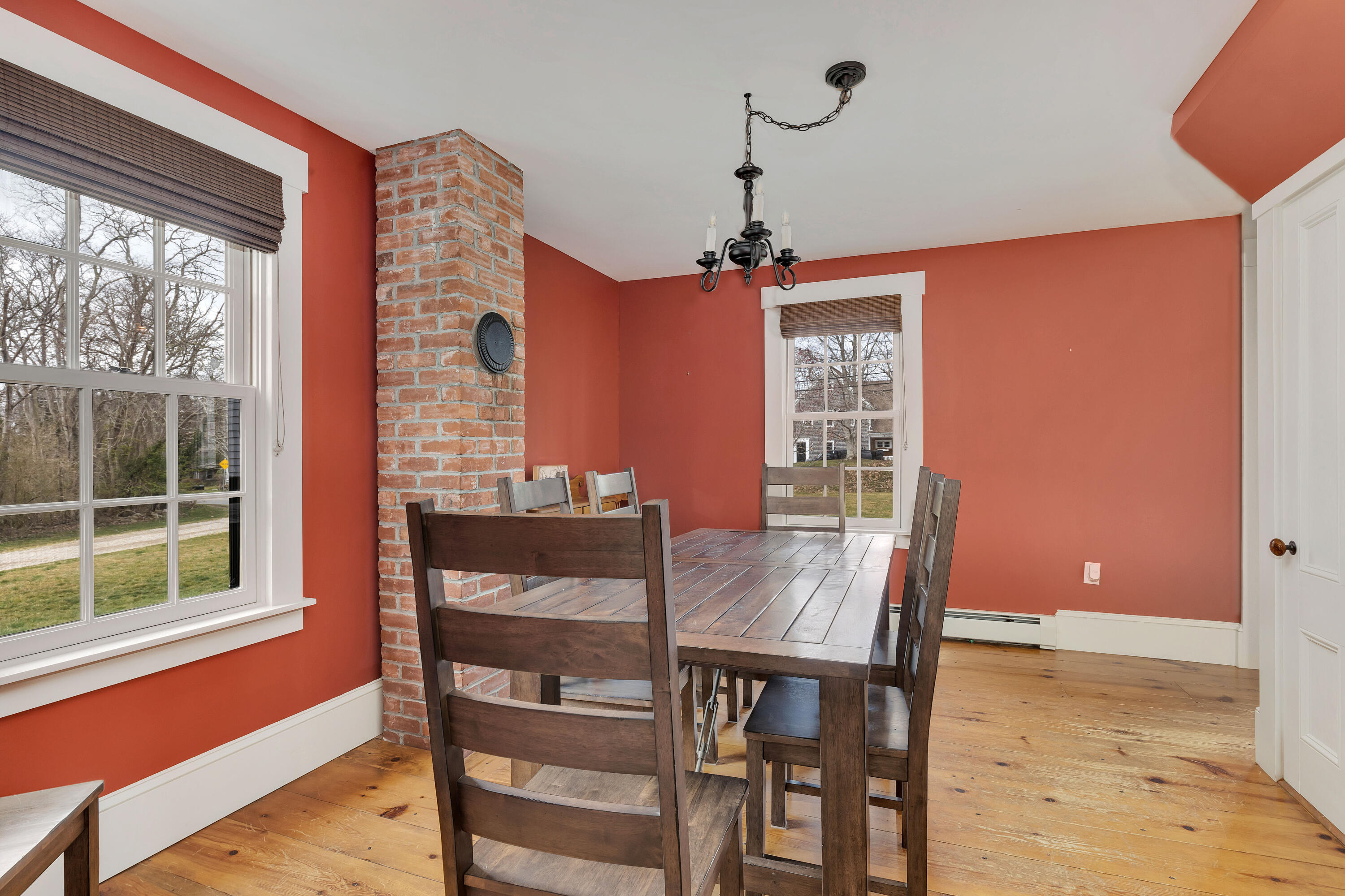 251 Tonset Road Orleans, MA 02653 - Photo 29 of 61 a view of a dining room with furniture window and wooden floor