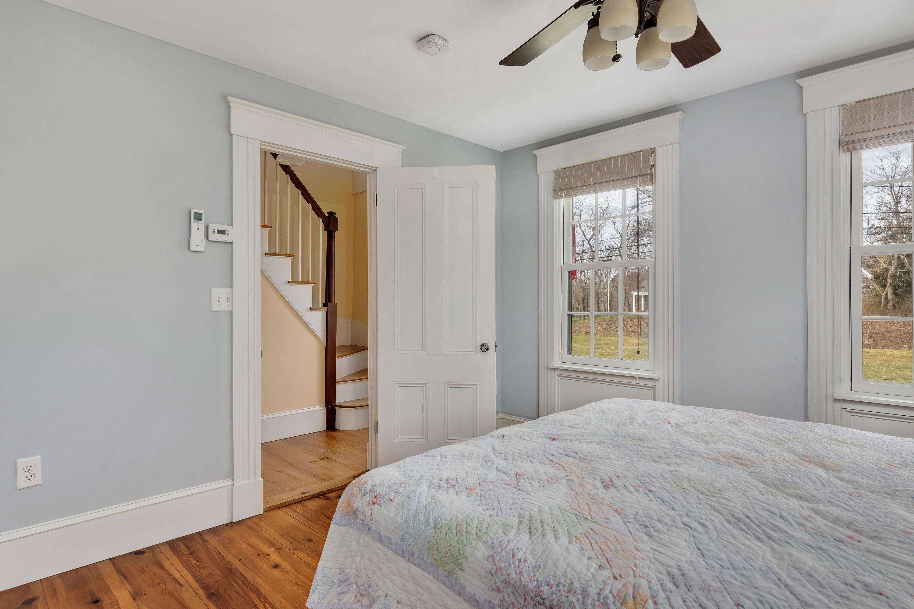 251 Tonset Road Orleans, MA 02653 - Photo 39 of 61 a bedroom with a bed and a window