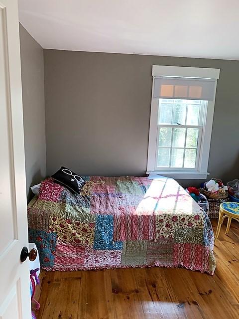 251 Tonset Road Orleans, MA 02653 - Photo 45 of 61 a bedroom with a bed and a window