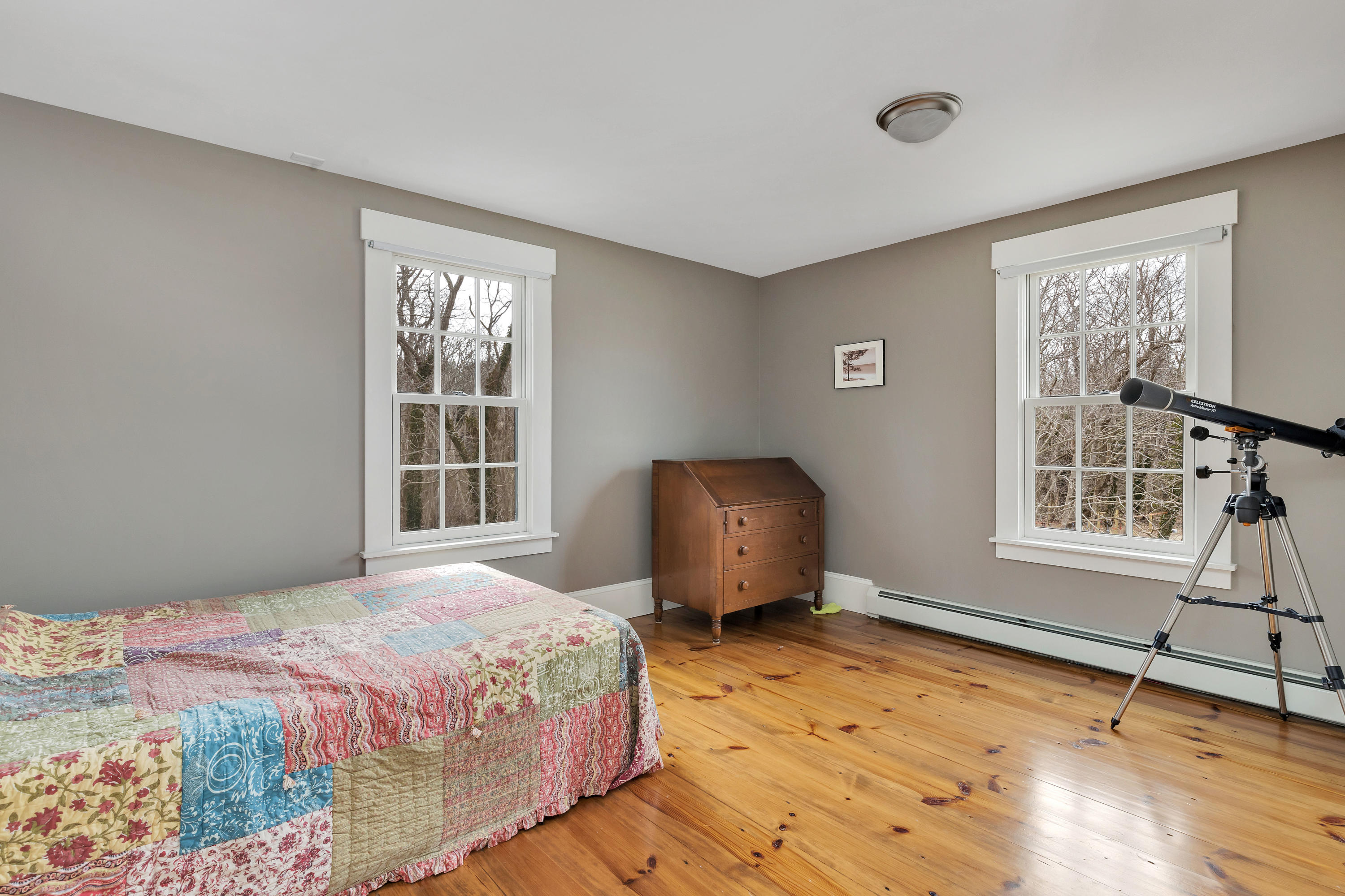 251 Tonset Road Orleans, MA 02653 - Photo 46 of 61 a bedroom with a bed and a window