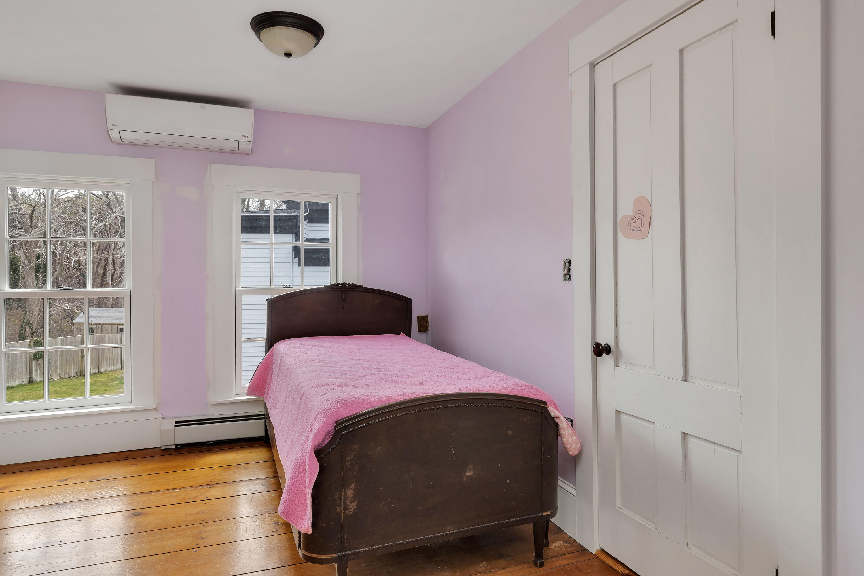 251 Tonset Road Orleans, MA 02653 - Photo 50 of 61 a bedroom with a bed and a window
