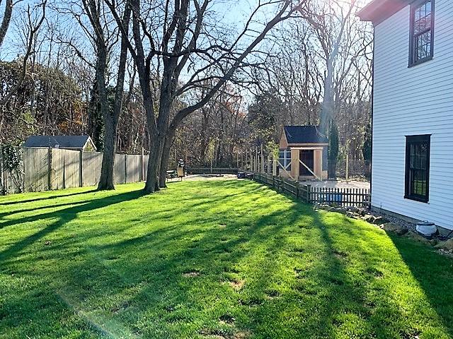 251 Tonset Road Orleans, MA 02653 - Photo 5 of 61 a view of a house with a backyard
