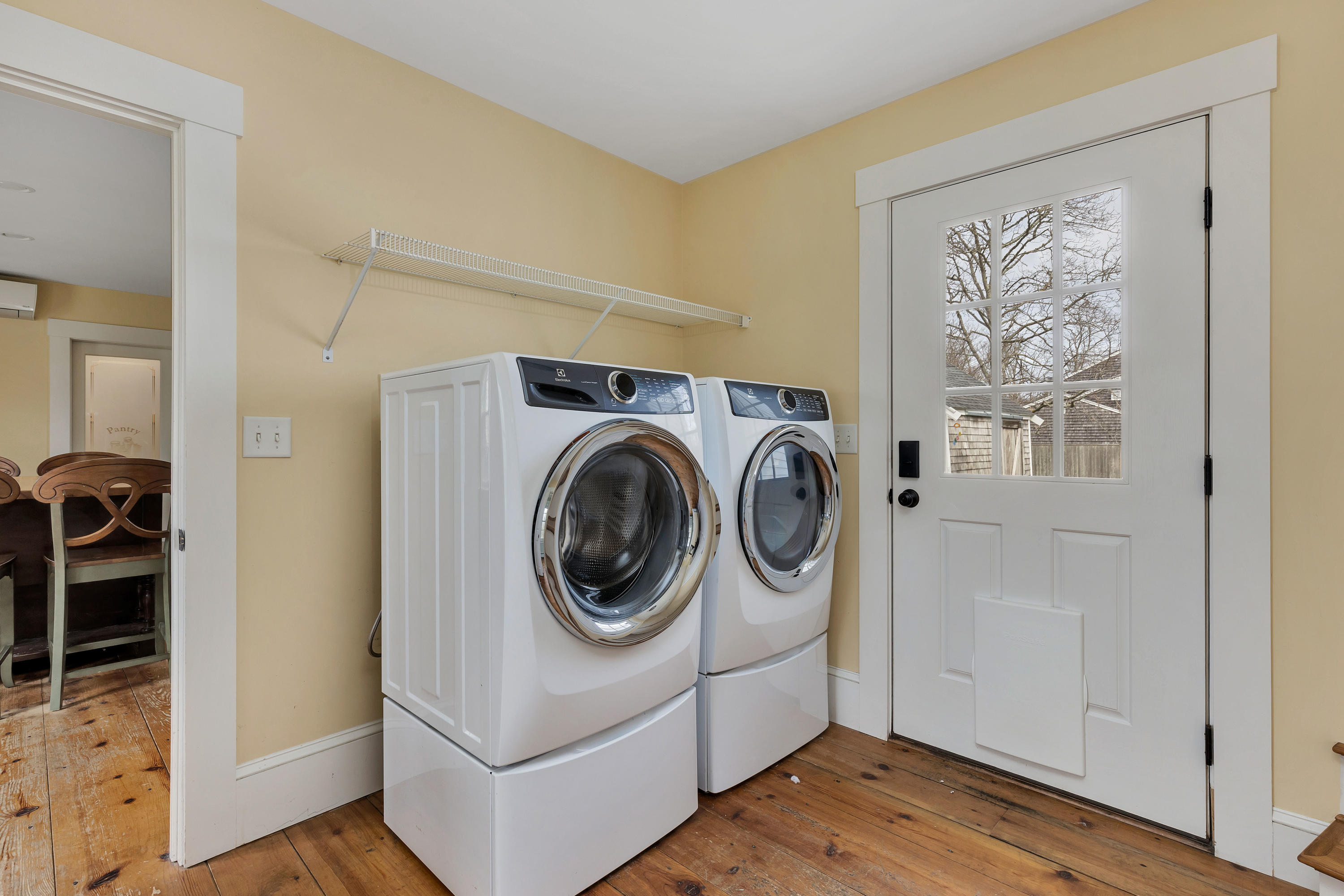 251 Tonset Road Orleans, MA 02653 - Photo 8 of 61 a utility room with dryer and washer