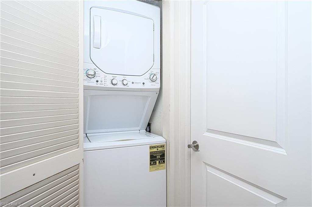 1280 Blue Point Avenue, Unit C30 Naples, FL 34102 - Photo 16 of 24 a view of washer and dryer