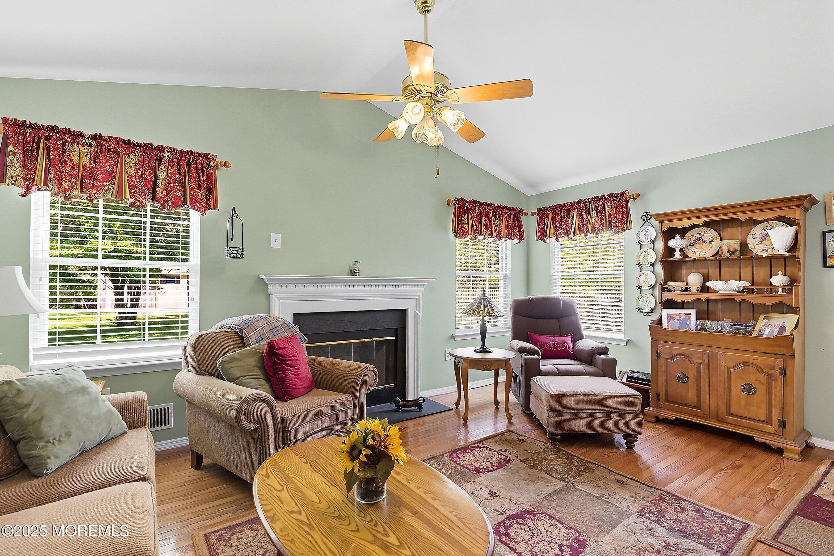1990 Country Trace Toms River, NJ 08753 - Photo 13 of 33 a living room with furniture and a fireplace
