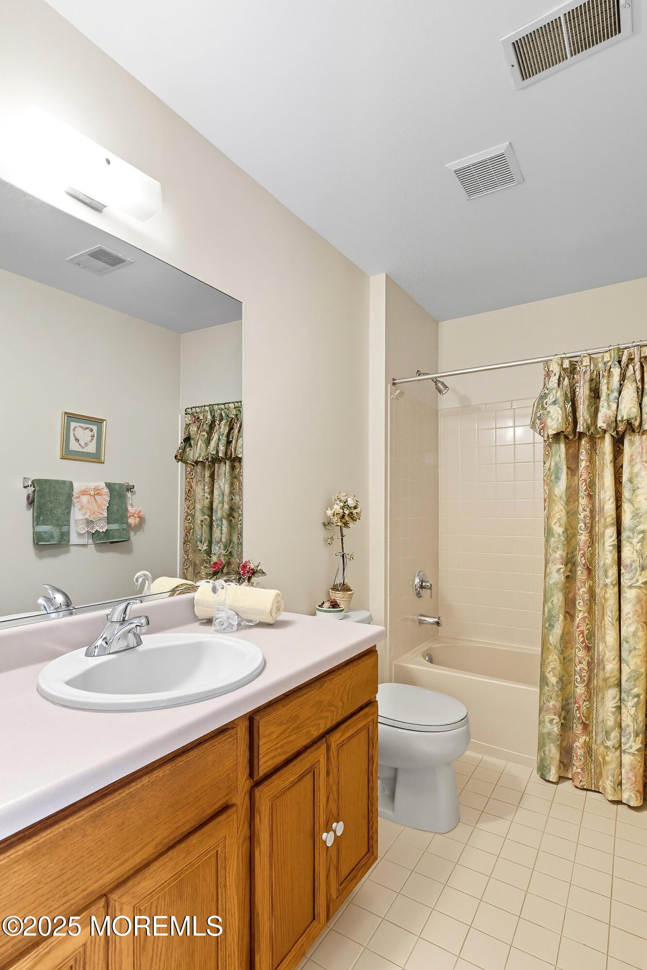1990 Country Trace Toms River, NJ 08753 - Photo 22 of 33 a bathroom with a double vanity sink toilet and shower