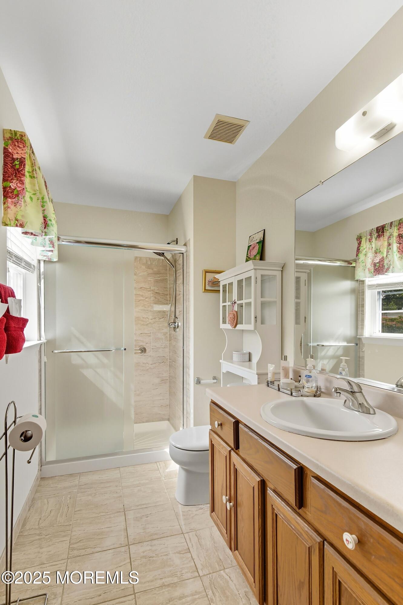 1990 Country Trace Toms River, NJ 08753 - Photo 26 of 33 a bathroom with a sink a toilet and shower