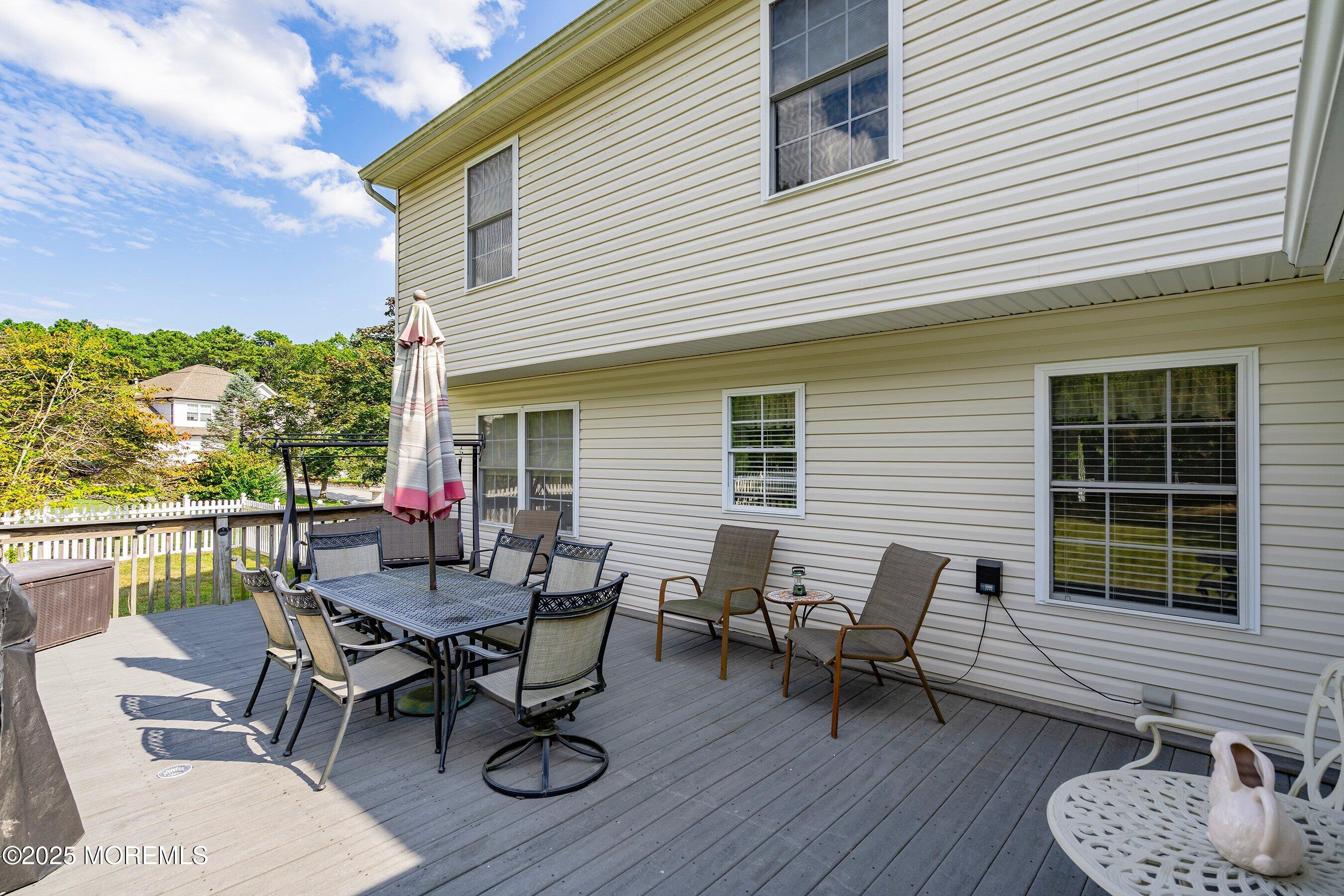 1990 Country Trace Toms River, NJ 08753 - Photo 29 of 33 a view of a patio with a table and chairs