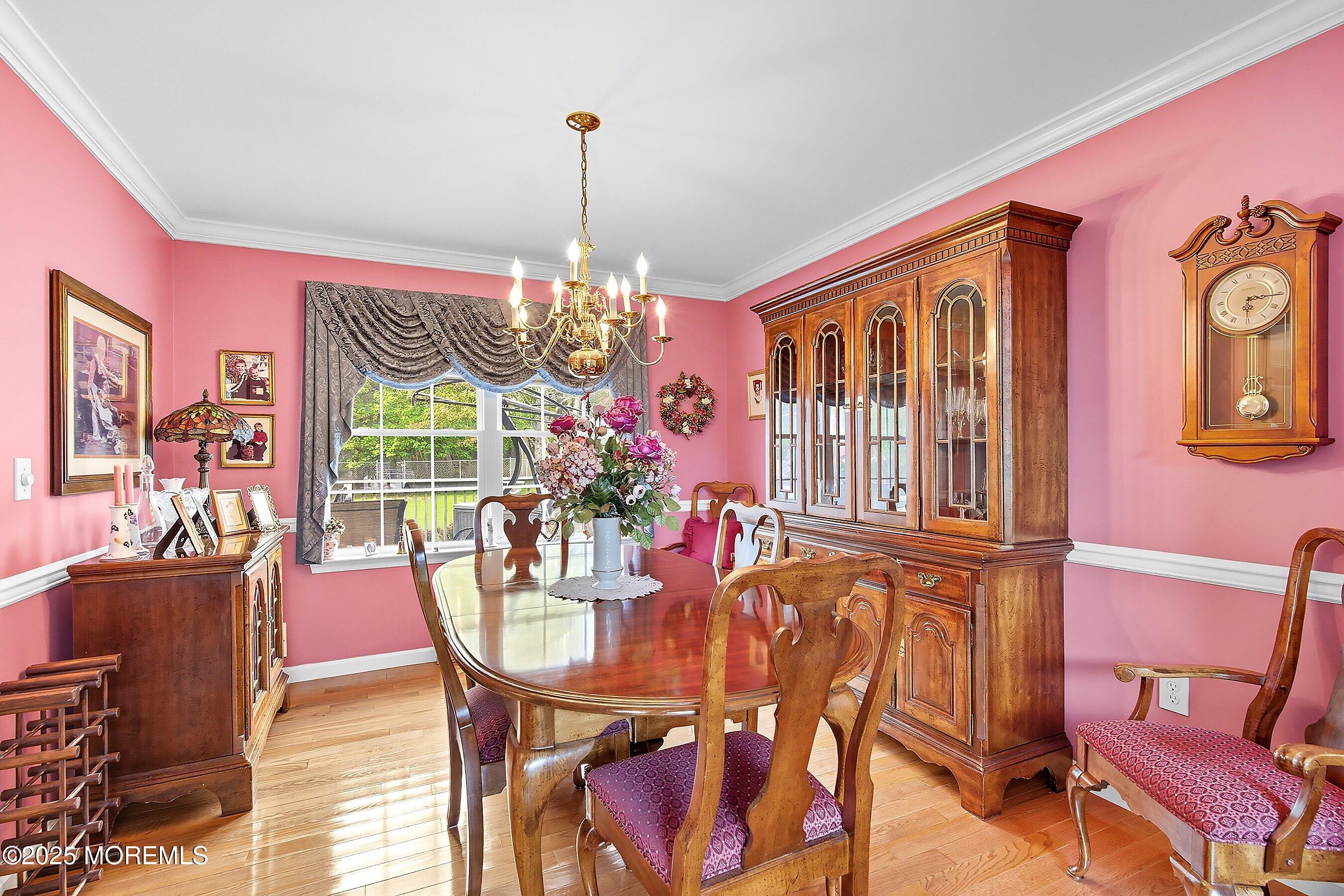 1990 Country Trace Toms River, NJ 08753 - Photo 7 of 33 a view of a dining room with furniture a chandelier and wooden floor