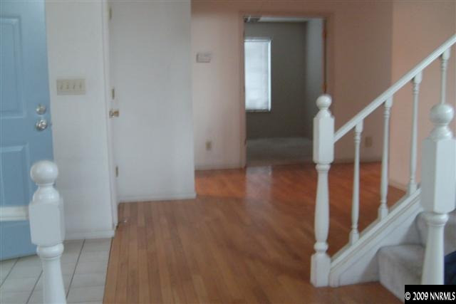 5140 Idlebury Way Reno, NV 89523 - Photo 3 of 9 a view of entryway with wooden floor