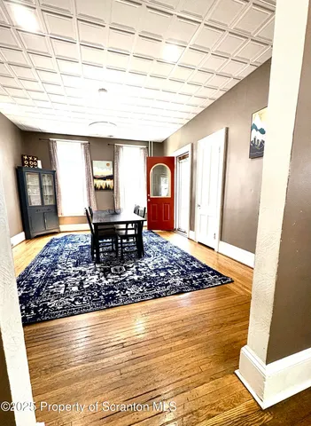 a dining room with chandelier
