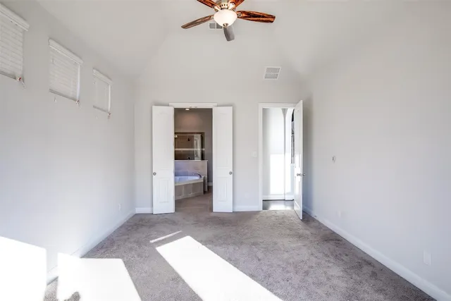 a bathroom with a tub sink and toilet