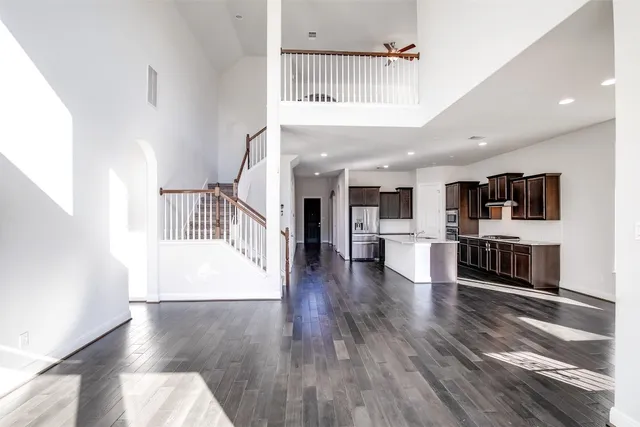 a large kitchen with stainless steel appliances