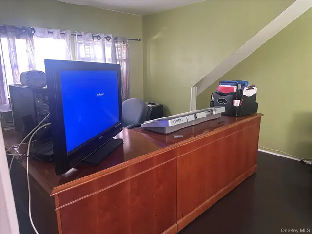 a room with furniture and window