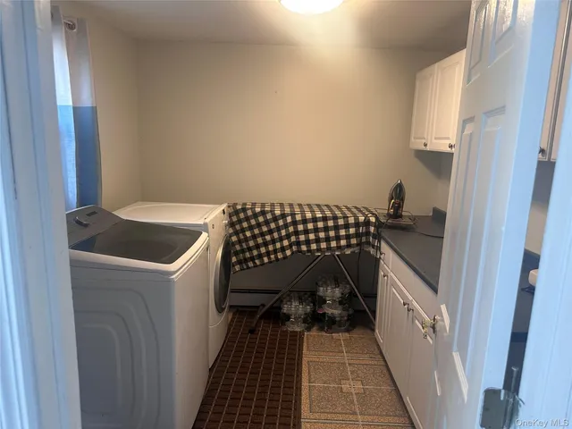 a close view of a sink and cabinets