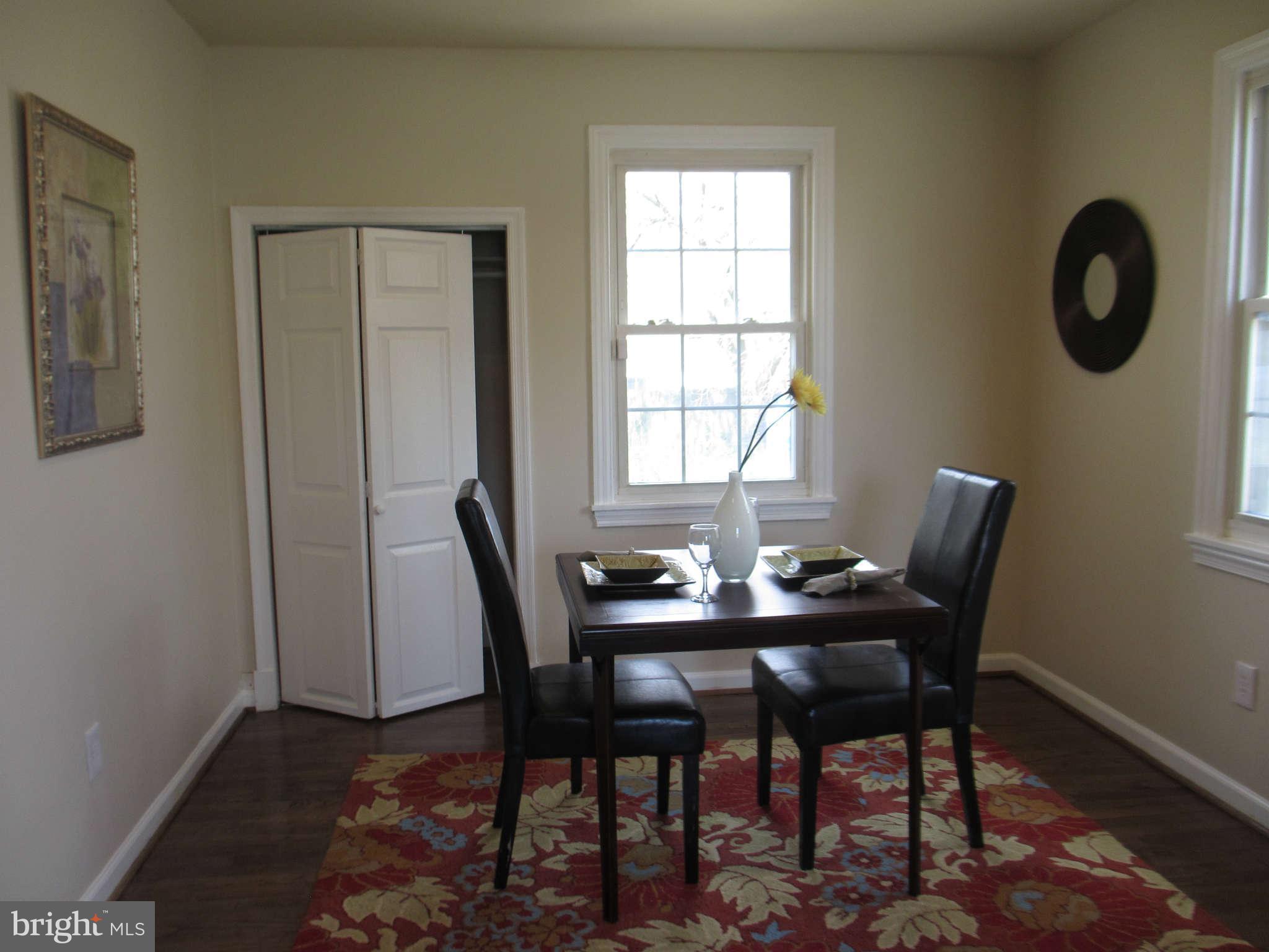 6600 Poplar Road Morningside, MD 20746 - Photo 5 of 13 a view of a dining room with furniture and window