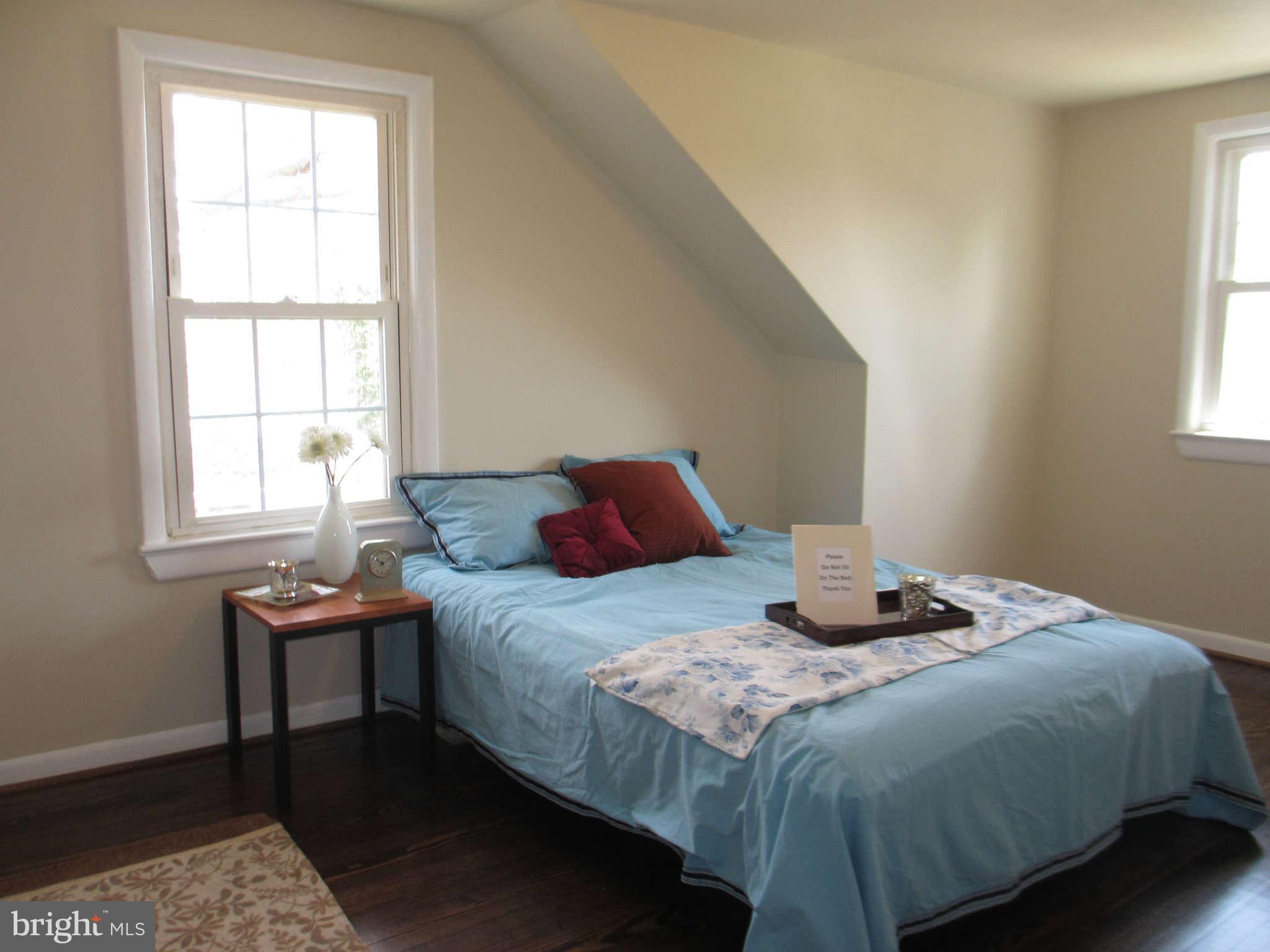 6600 Poplar Road Morningside, MD 20746 - Photo 7 of 13 a bedroom with a bed and window