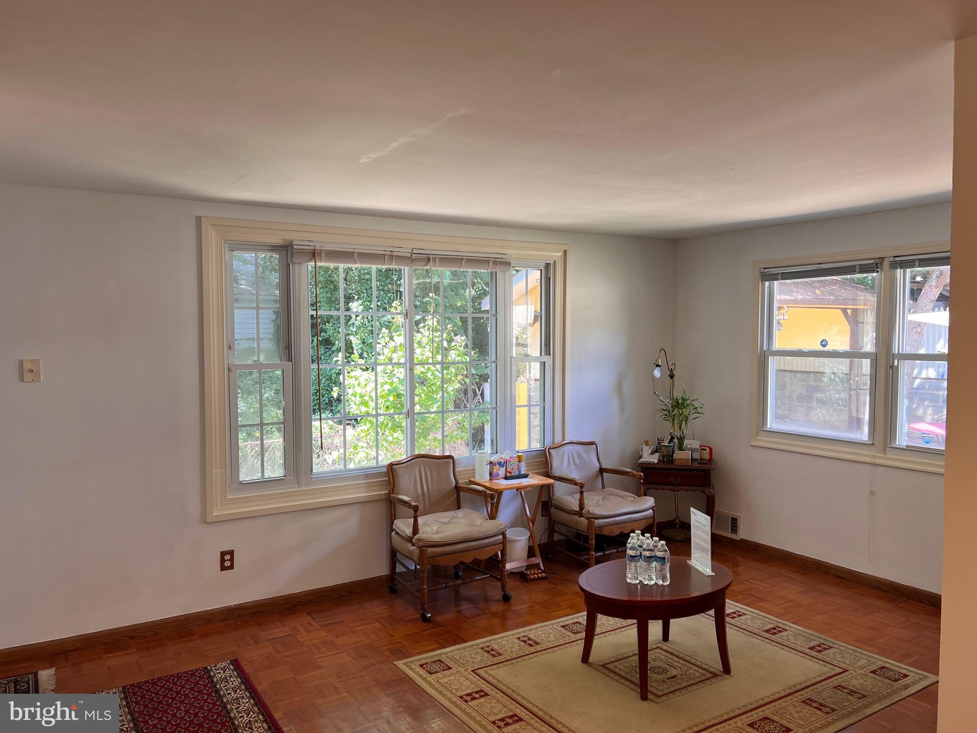 12205 Goodhill Road Silver Spring, MD 20902 - Photo 23 of 35 a living room with furniture and a window