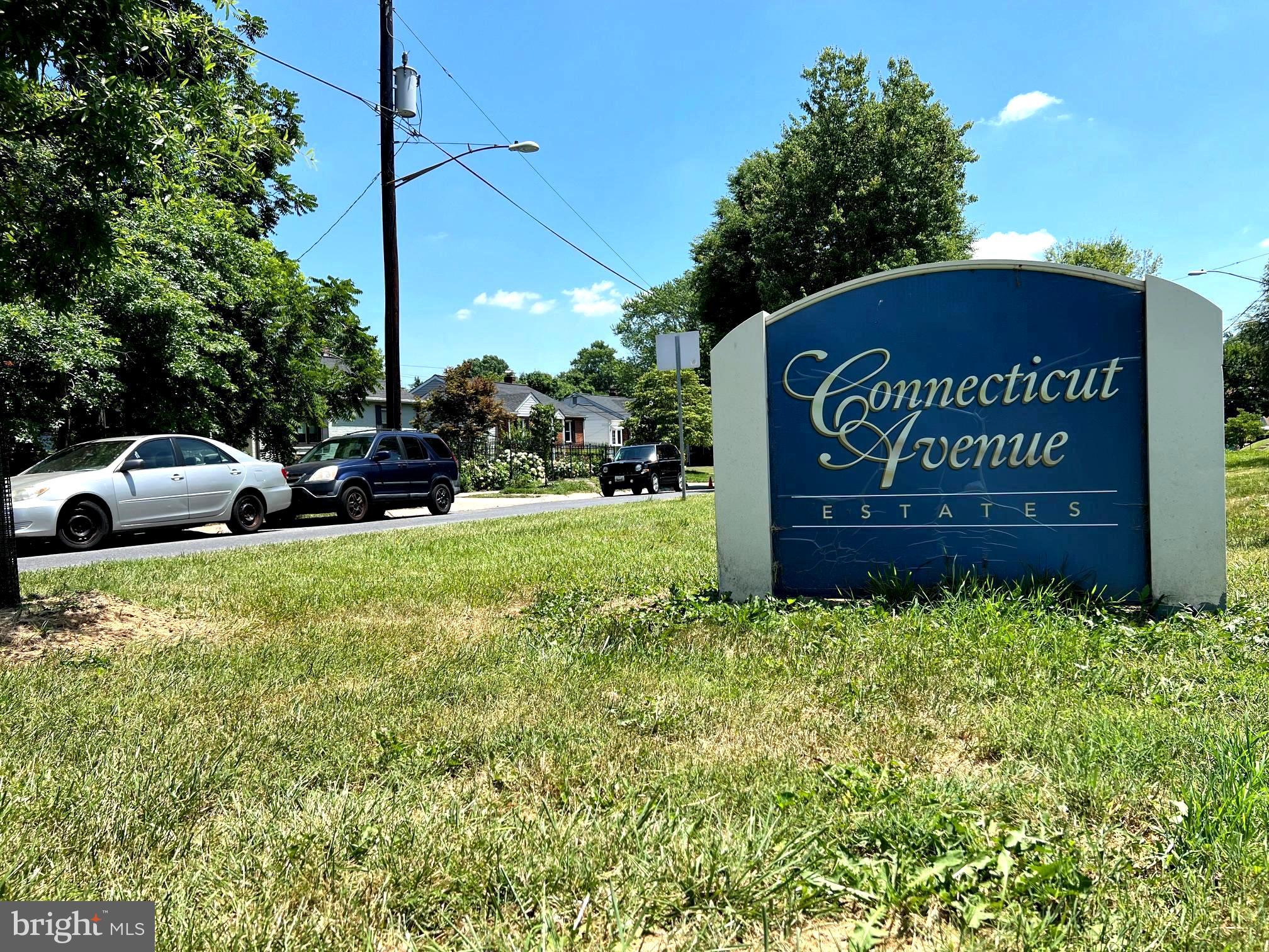 12205 Goodhill Road Silver Spring, MD 20902 - Photo 4 of 35 a view of a sign board with a yard