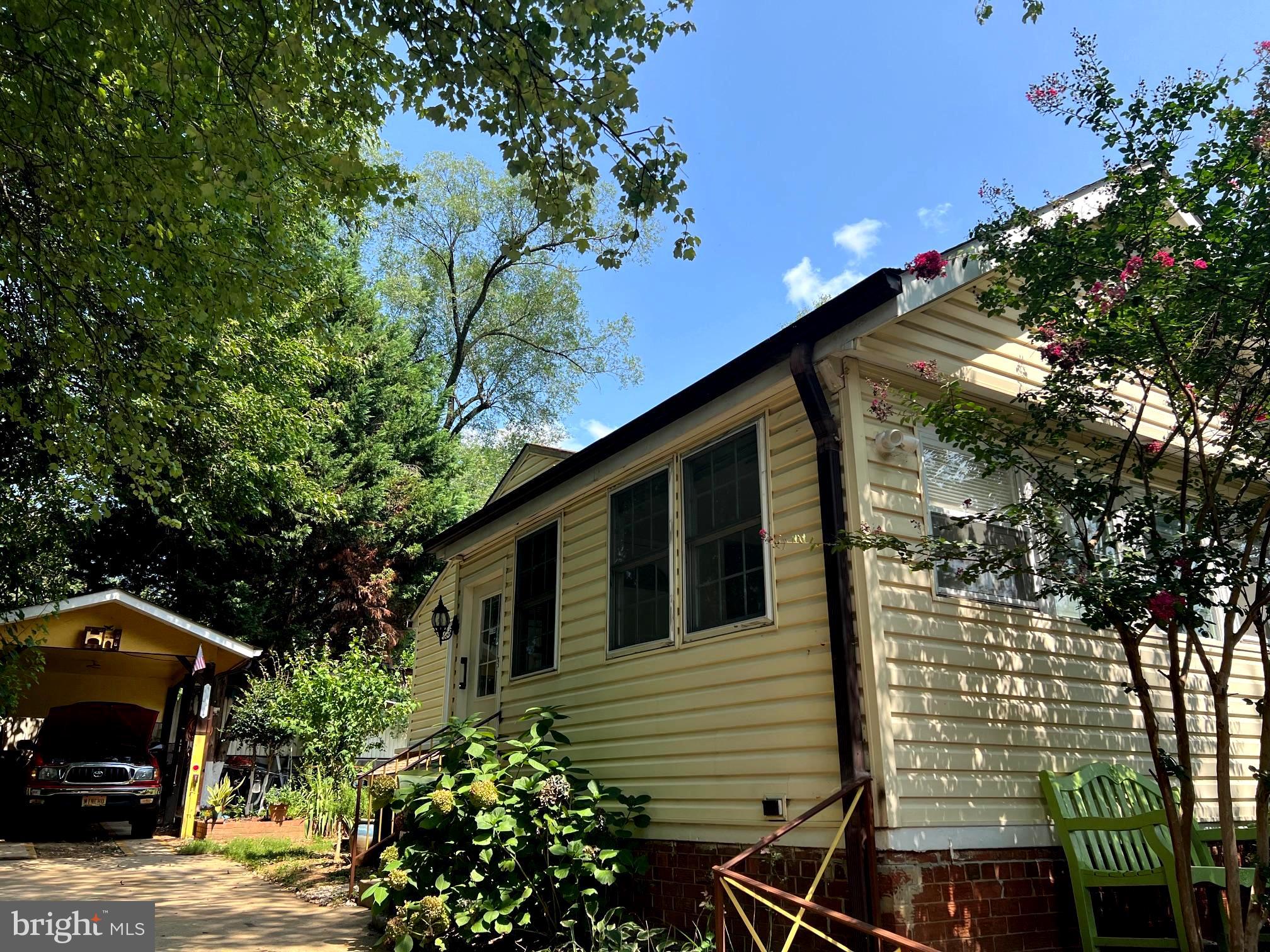 12205 Goodhill Road Silver Spring, MD 20902 - Photo 5 of 35 a view of a house with a tree