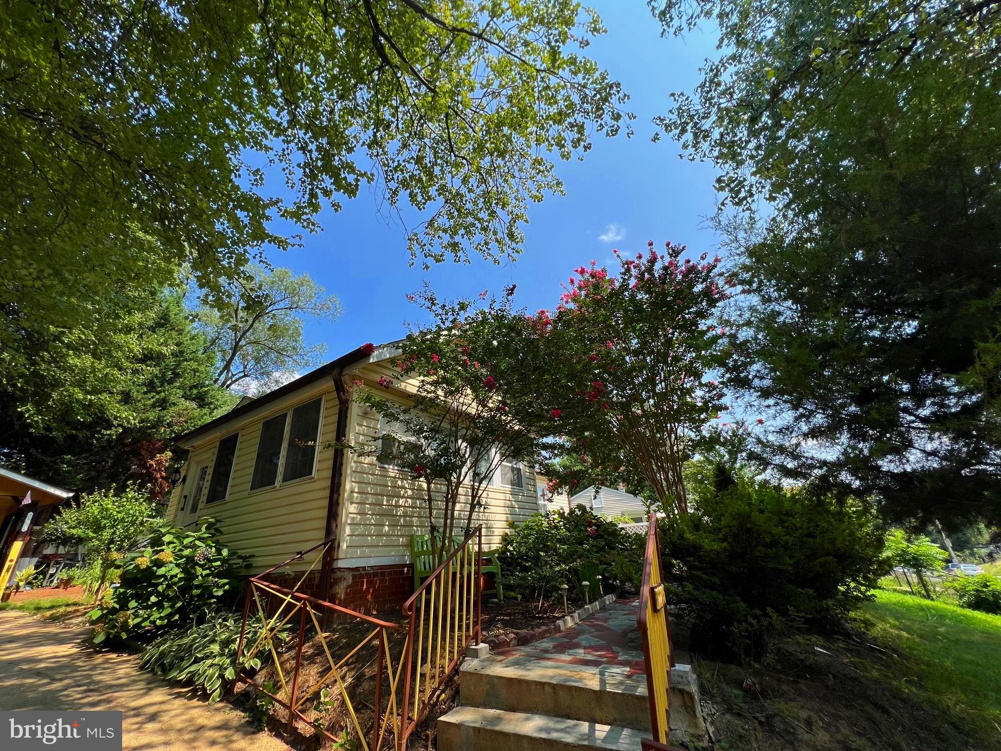 12205 Goodhill Road Silver Spring, MD 20902 - Photo 6 of 35 a view of a house with large tree