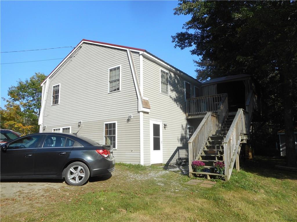 67 Maple Grove South China, ME 04358 - Photo 1 of 33 Front door and the stairway to upper...