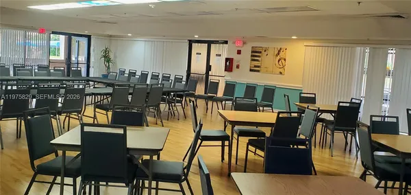 a group of people sitting in a room