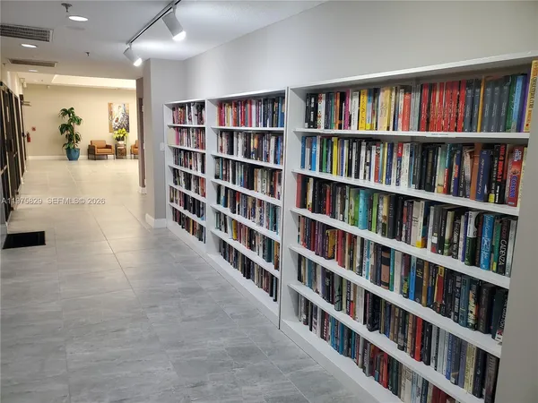 a view of swimming pool with outdoor space and lake view
