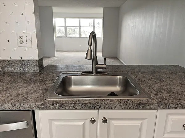 a view of a balcony with wooden floor