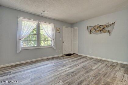 24 Sanders Road Wilmington, NC 28412 - Photo 11 of 28 View of living room.